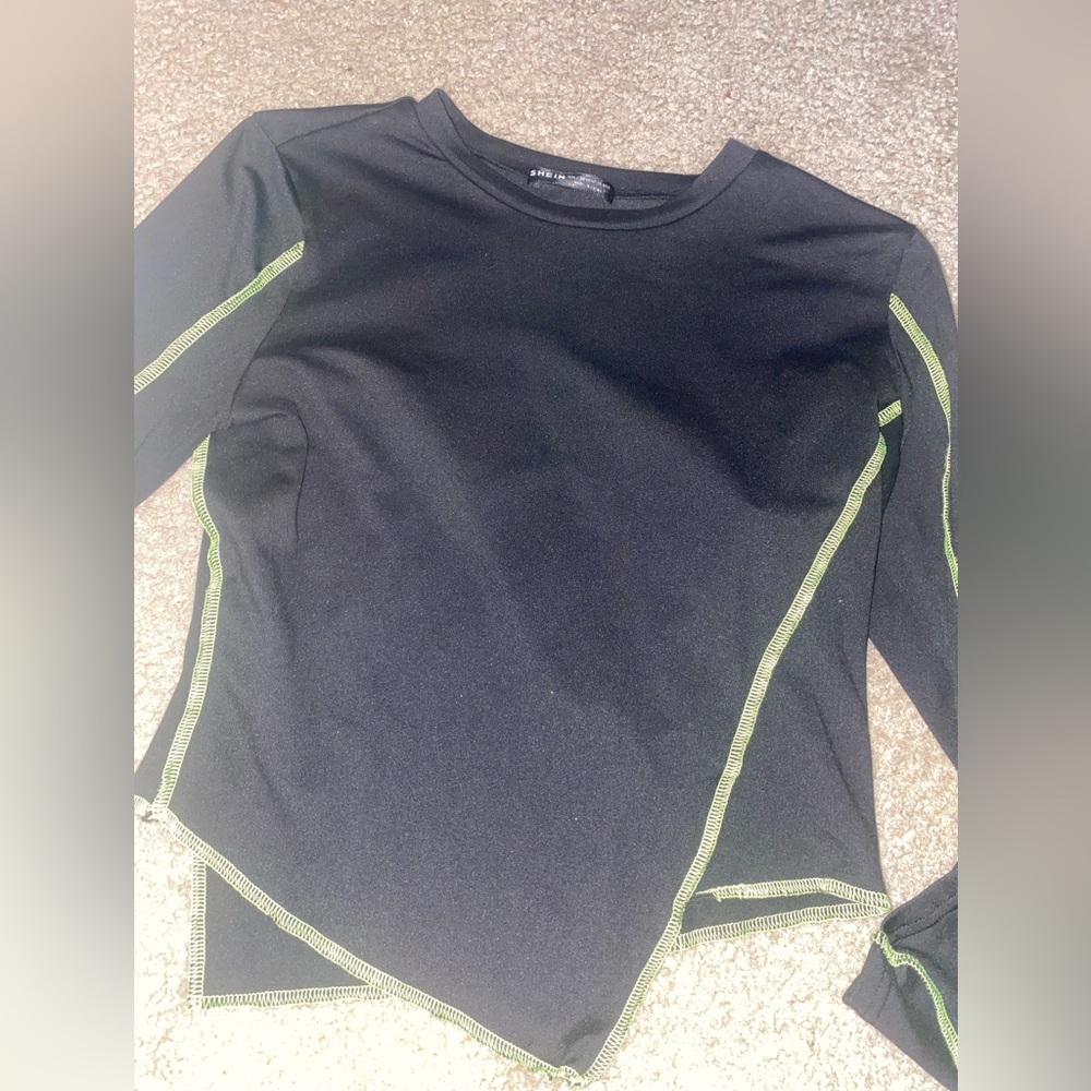 Black asymmetric long sleeve crop top